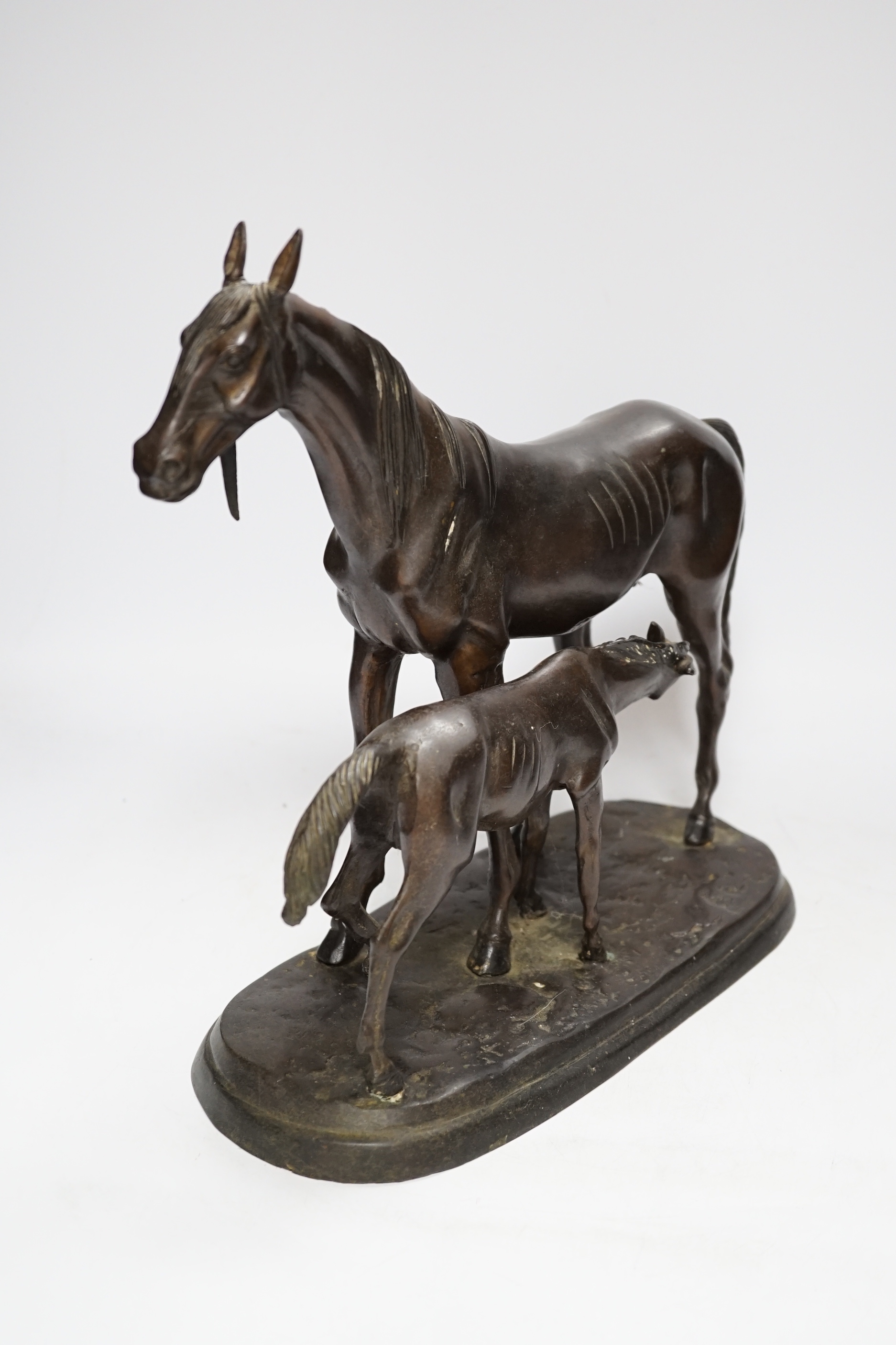 A modern bronze mare and foal, 32cm long